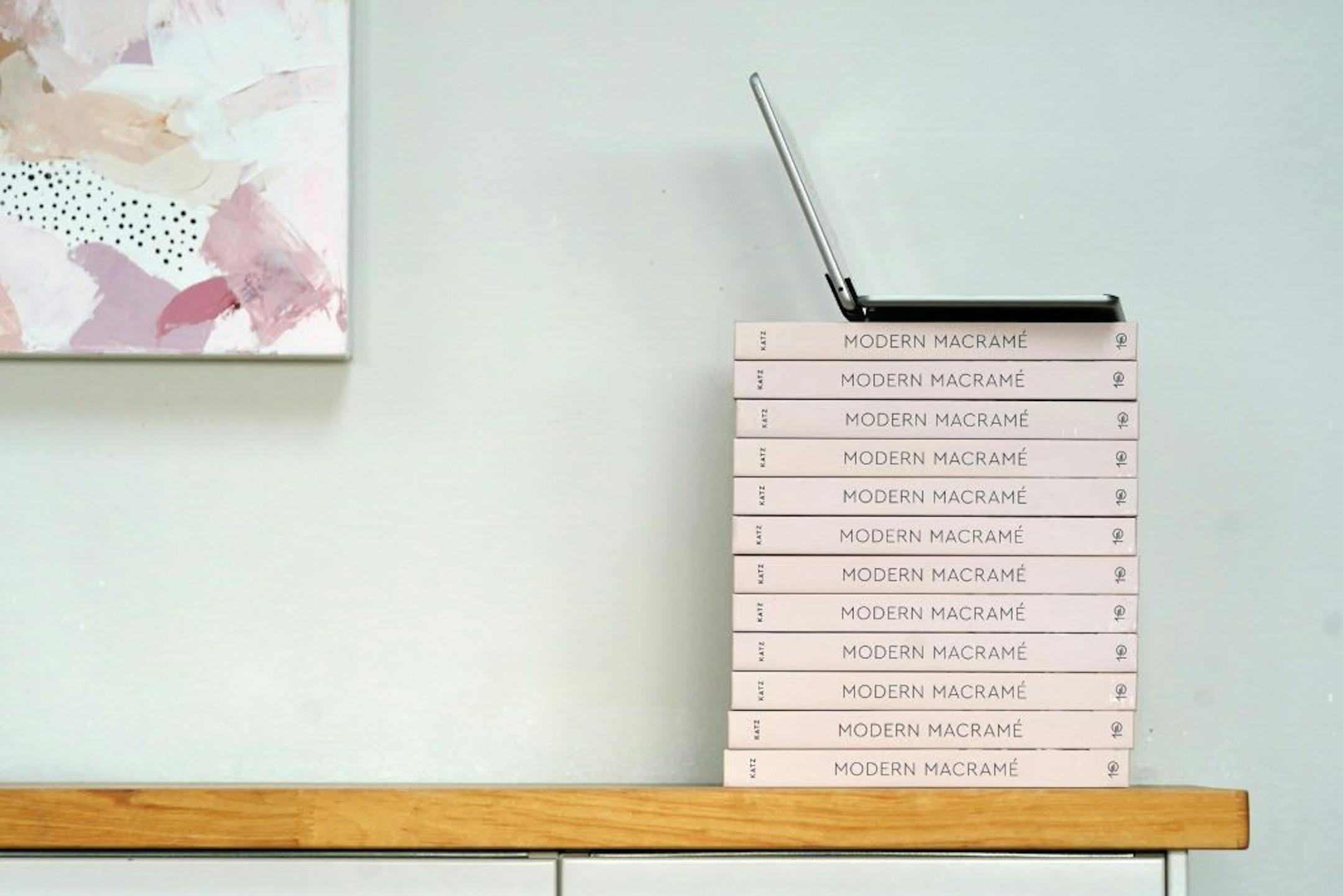 Emily Katz's tablet sat atop a stack of her books Modern Macrame during her class.