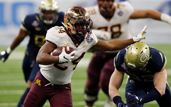 Gophers running back Mohamed Ibrahim carried the ball during his 224-yard performance against Georgia Tech in the 2018 Quick Lane Bowl.