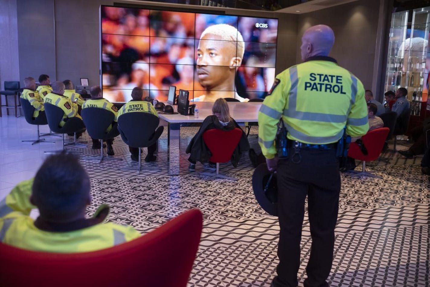 At the Radisson Blu, the hotel for Texas Tech, State Patrol officers who were on standby watched the end of the national championship men's basketball game between Texas Tech and Virginia.