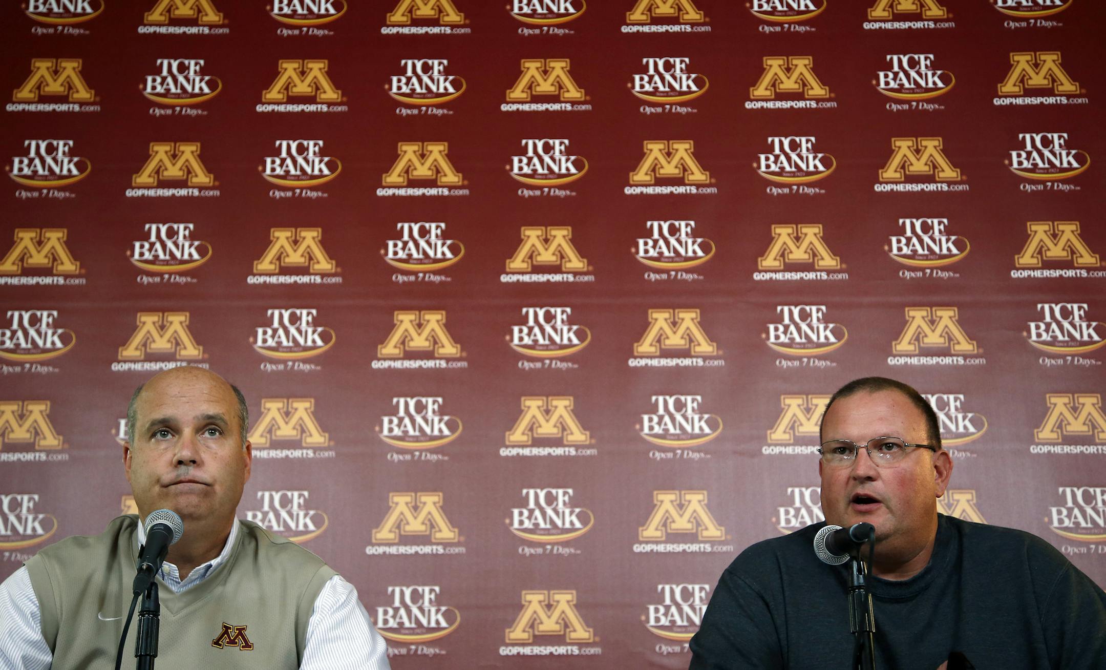 University of Minnesota athletic director Norwood Teague and Tracy Claeys during a press conference on Thursday. Claeys will take over as interim head coach for head football coach Jerry Kill who is taking time off to try to manage his epilepsy. ] CARLOS GONZALEZ cgonzalez@startribune.com October 10, 2013, Minneapolis, Minn., TCF Bank Stadium, University of Minnesota Gophers football, Gophers football coach Jerry Kill is taking time off to try to manage his epilepsy after missing last Saturday's