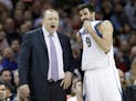 Minnesota Timberwolves head coach Tom Thibodeau, left, talks with Ricky Rubio in the second half of a game in February.