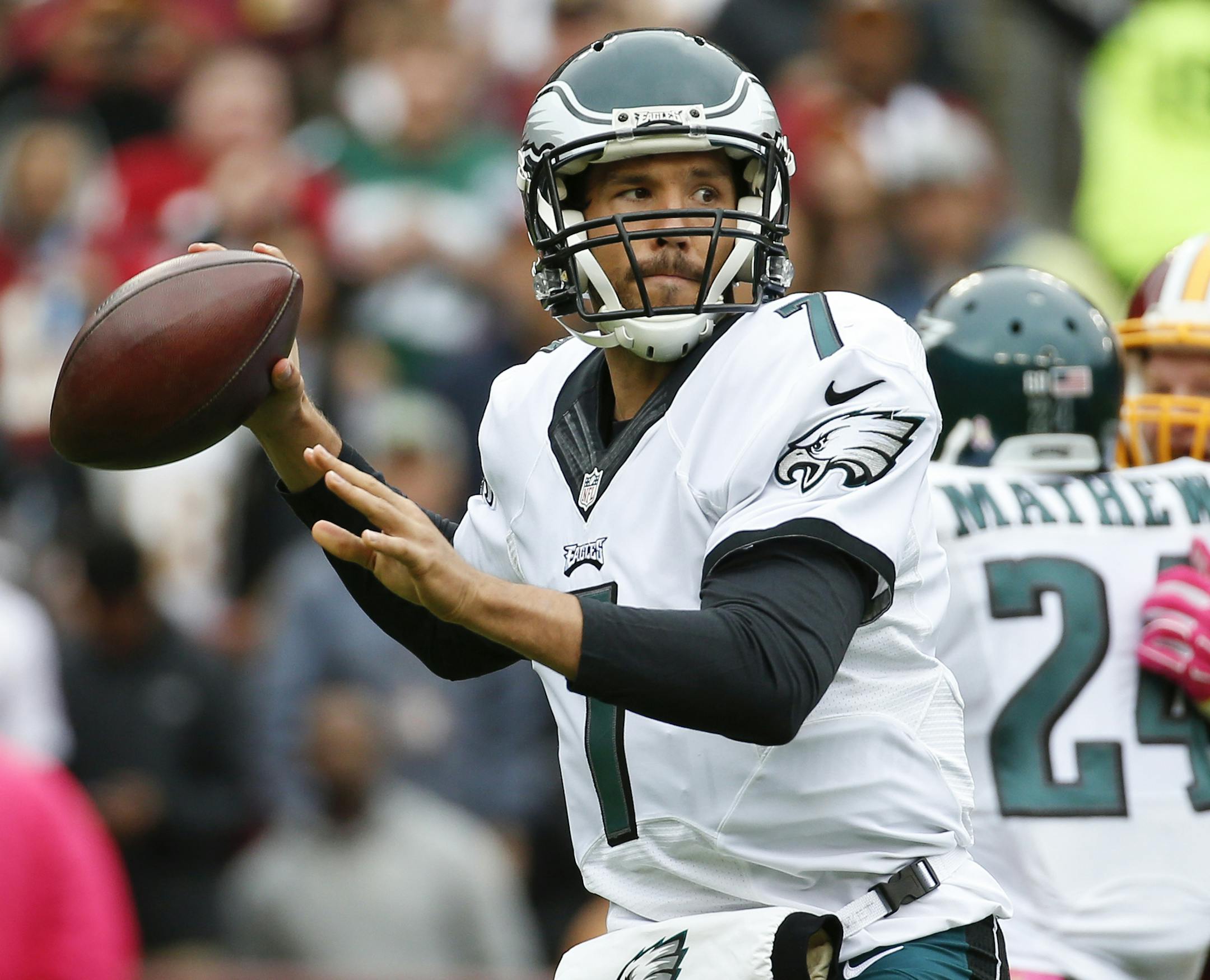 Philadelphia Eagles quarterback Sam Bradford (7) passes the ball during the first half of an NFL football game against the Washington Redskins in Landover, Md., Sunday, Oct. 4, 2015. (AP Photo/Alex Brandon)
