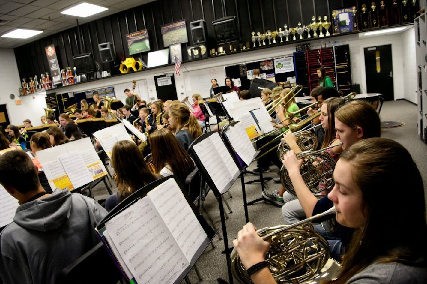 Rosemount HS Marching band is heading to the Macy's Thanksgiving Day Parade. This concert band is one of the schools bands that feeds into the Marching Band. The shelf in the band room is crowded with trophies from past achievements.