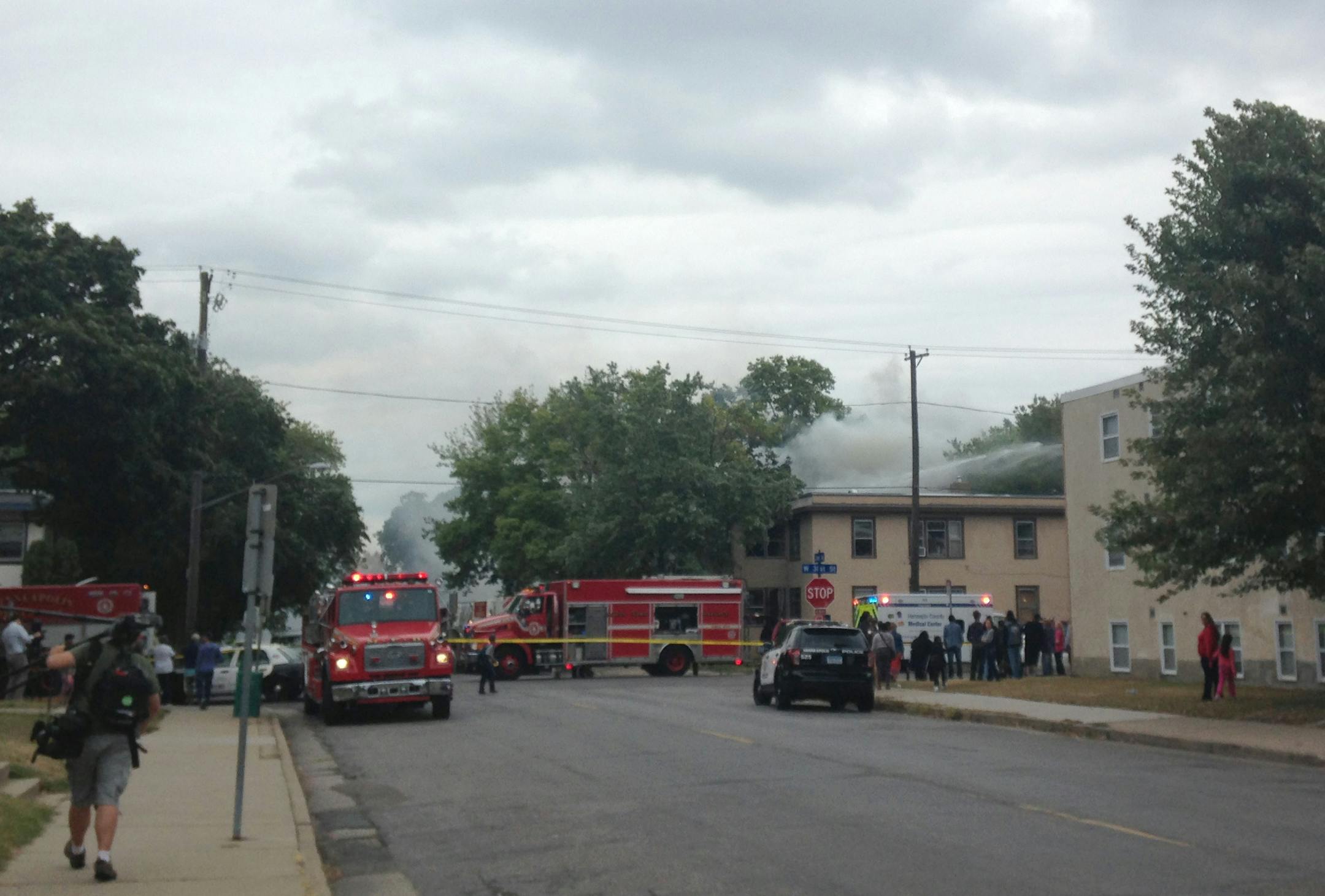 Firefighters are on the scene of a house fire and possible explosion in the near Grand Ave. and 30th St. in south Minneapolis on Tuesday, Sept. 17, 2013.