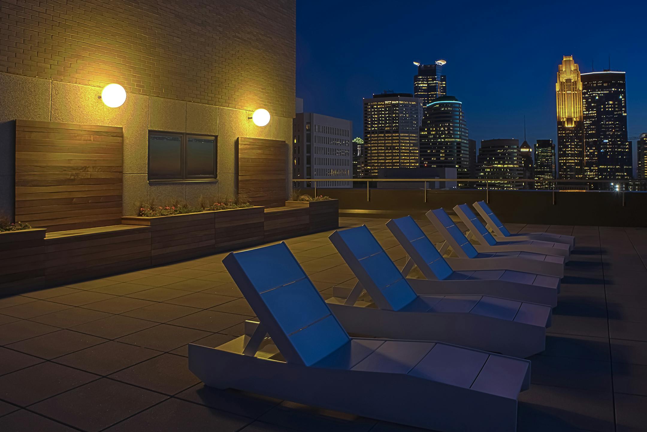 A view of the Minneapolis skyline from the Towers apartments rooftop patio.
