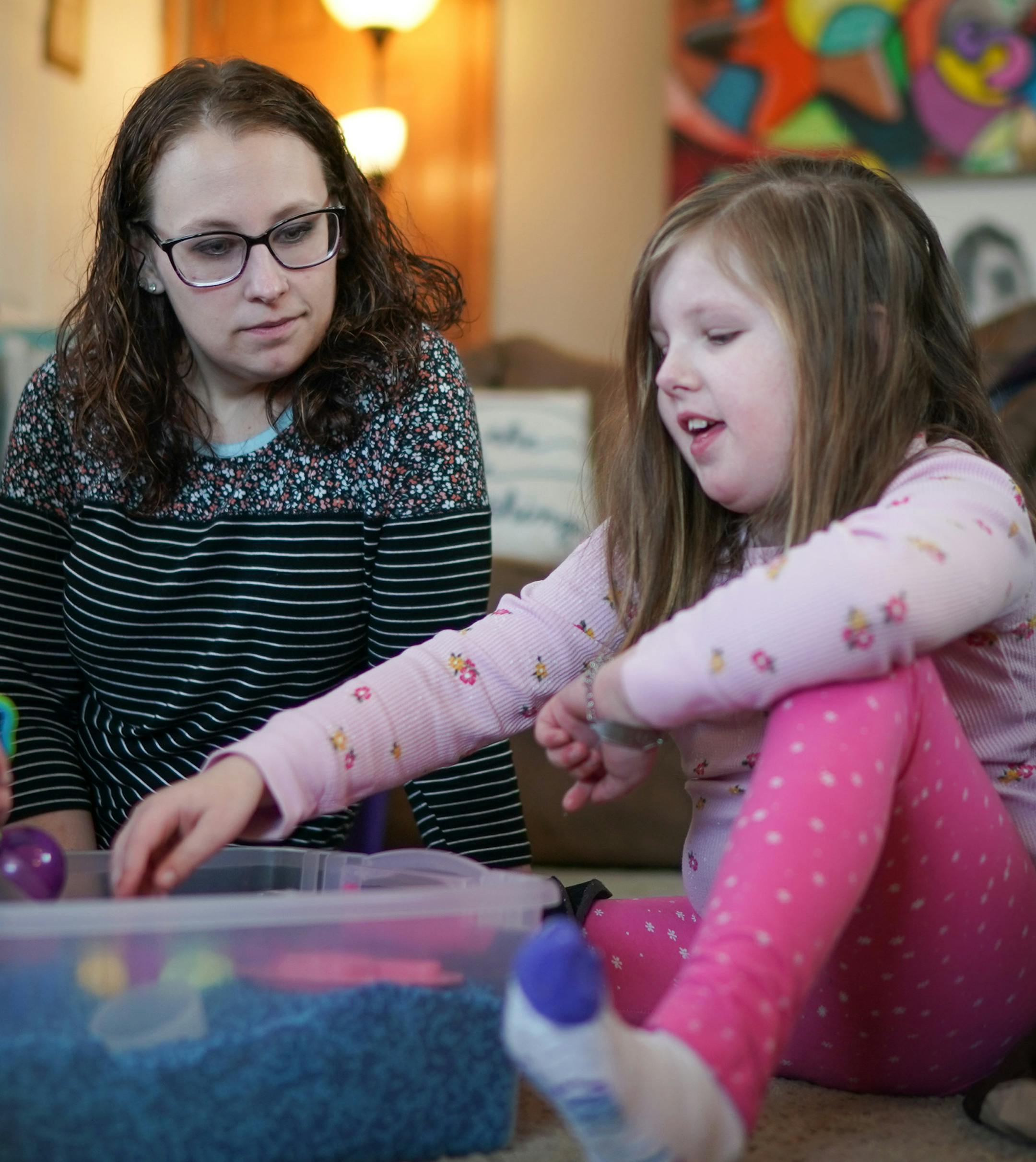 After both girls get home from school, Linsey Rippy has her daughters Madi, 12, and Sydney, 9, play with a sensory box to de-stress after their day at school. She can more easily talk to them about their day. After that they watch a little TV while Linsey gets dinner ready. ] GLEN STUBBE • glen.stubbe@startribune.com Thursday, March 21, 2019 More Minnesota schools are in danger of losing herd immunity for the measles and other infectious diseases, a Star Tribune analysis shows. This comes