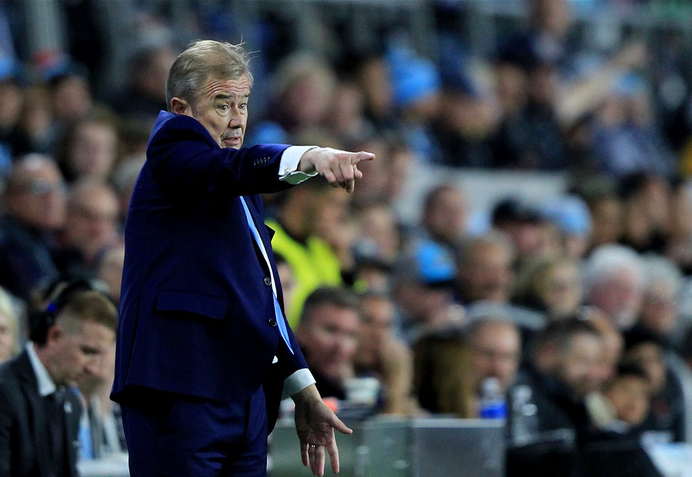 Minnesota United head coach Adrian Heath gestures against the LA Galaxy during the second half of an MLS first-round playoff soccer match Sunday, Oct. 20, 2019 in St. Paul, Minn.(AP Photo/Andy Clayton-King)