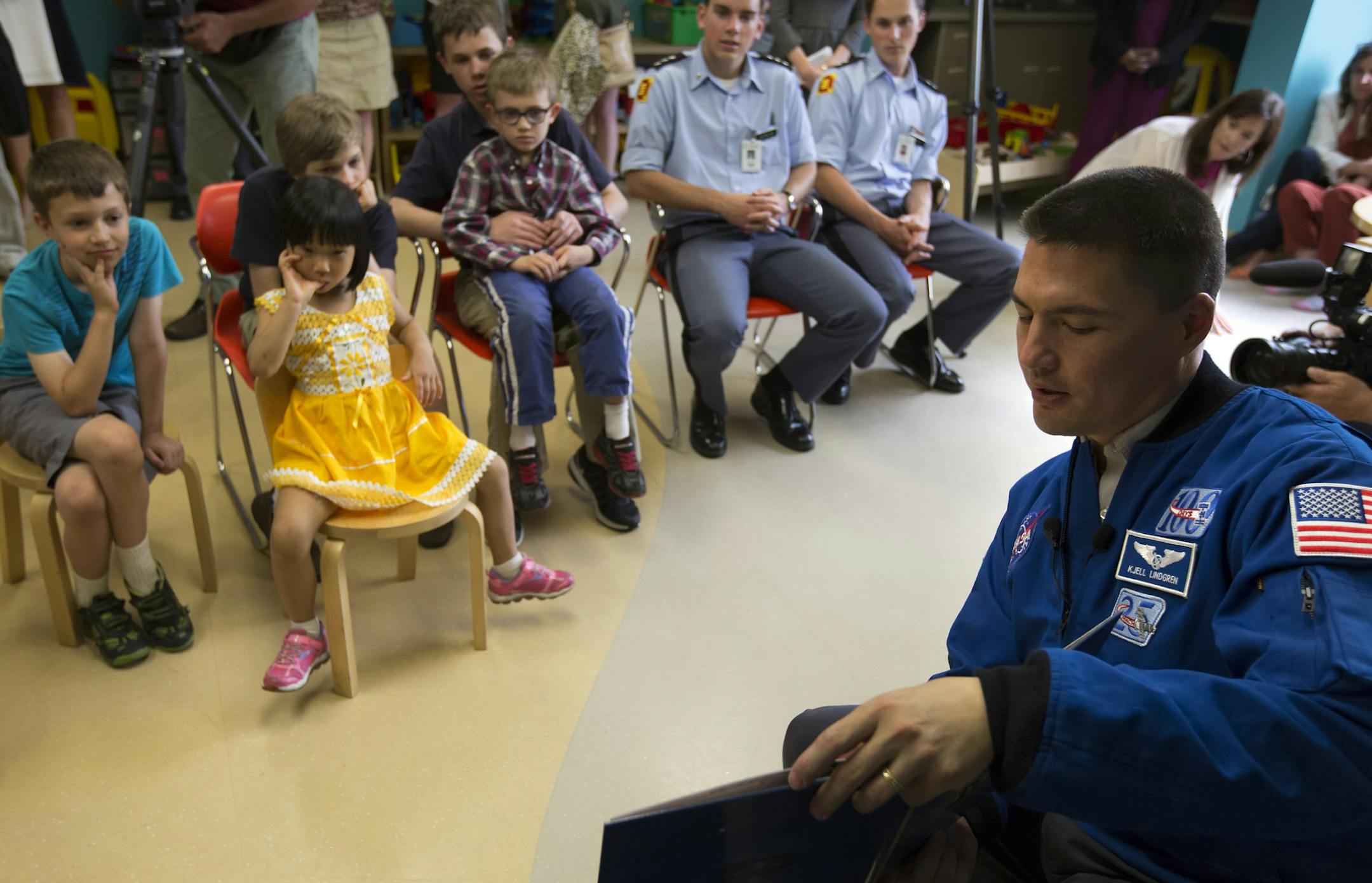 Dr. Kjell Lindgren has returned to Earth from a mission on the International Space Station, and Wednesday he visited HCMC in Minneapolis, where he was a doctor, and read the book Moustronaut, (Written by former NASA shuttle commander Mark Kelly.) to pediatric patients. ] Minneapolis, MN - 05/25/2016