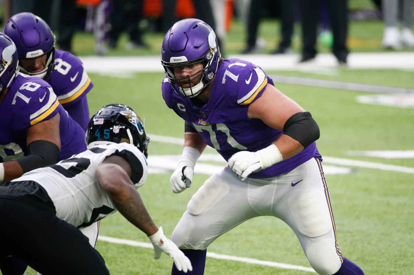 Minnesota Vikings offensive tackle Riley Reiff (71) looks to make a block during the second half of an NFL football game against the Jacksonville Jaguars, Sunday, Dec. 6, 2020, in Minneapolis. (AP Photo/Bruce Kluckhohn)