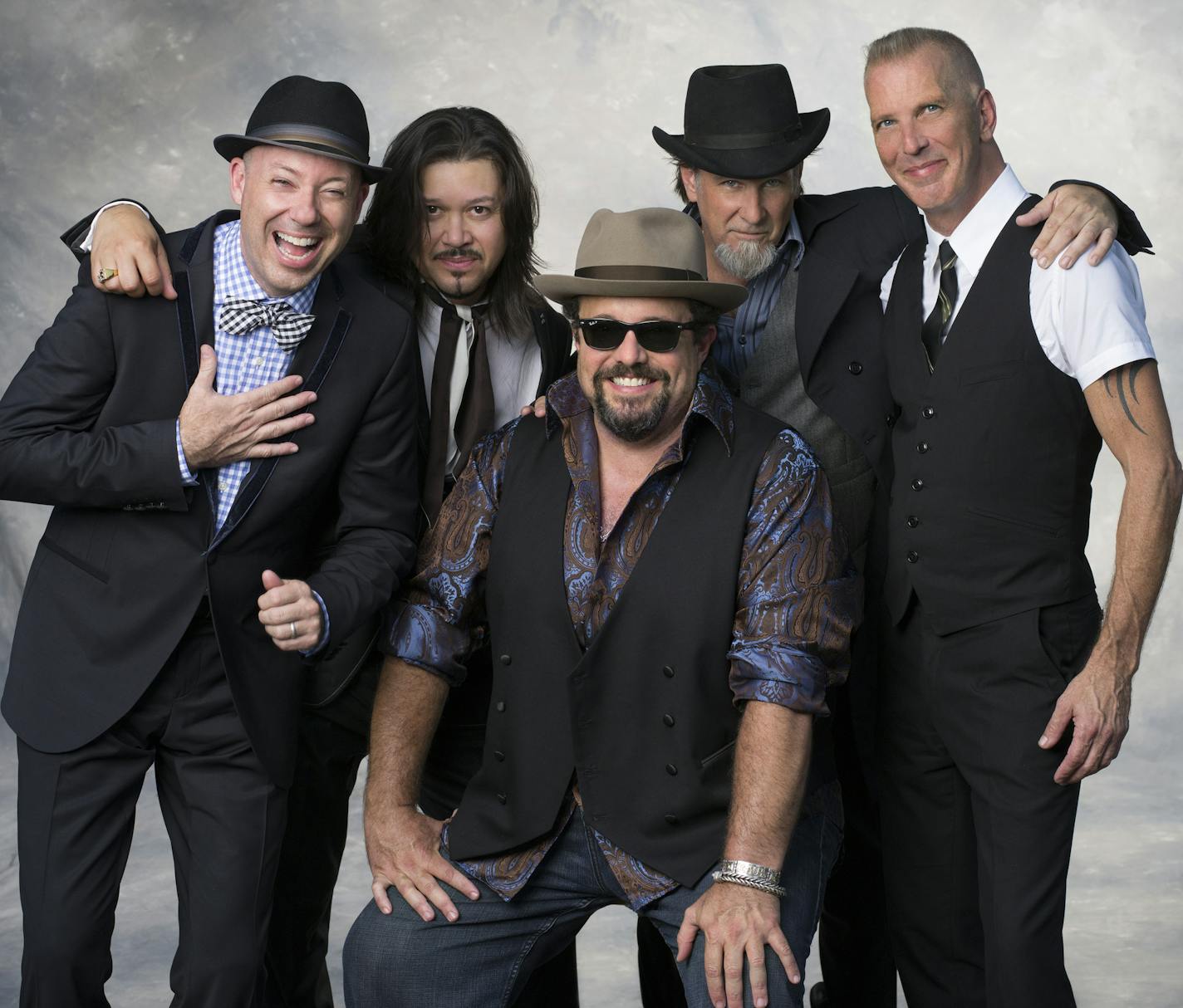 Photo by Mark Tucker; Publicity photo of the band the Mavericks. Raul Malo is center and sitting