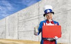 A patriotic Uncle Sam character covering begging for donations with a tin cup full of money while holding a blank red sign in his other hand. He is we