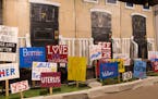 Minn. artists take aim at election with crafty lawn signs