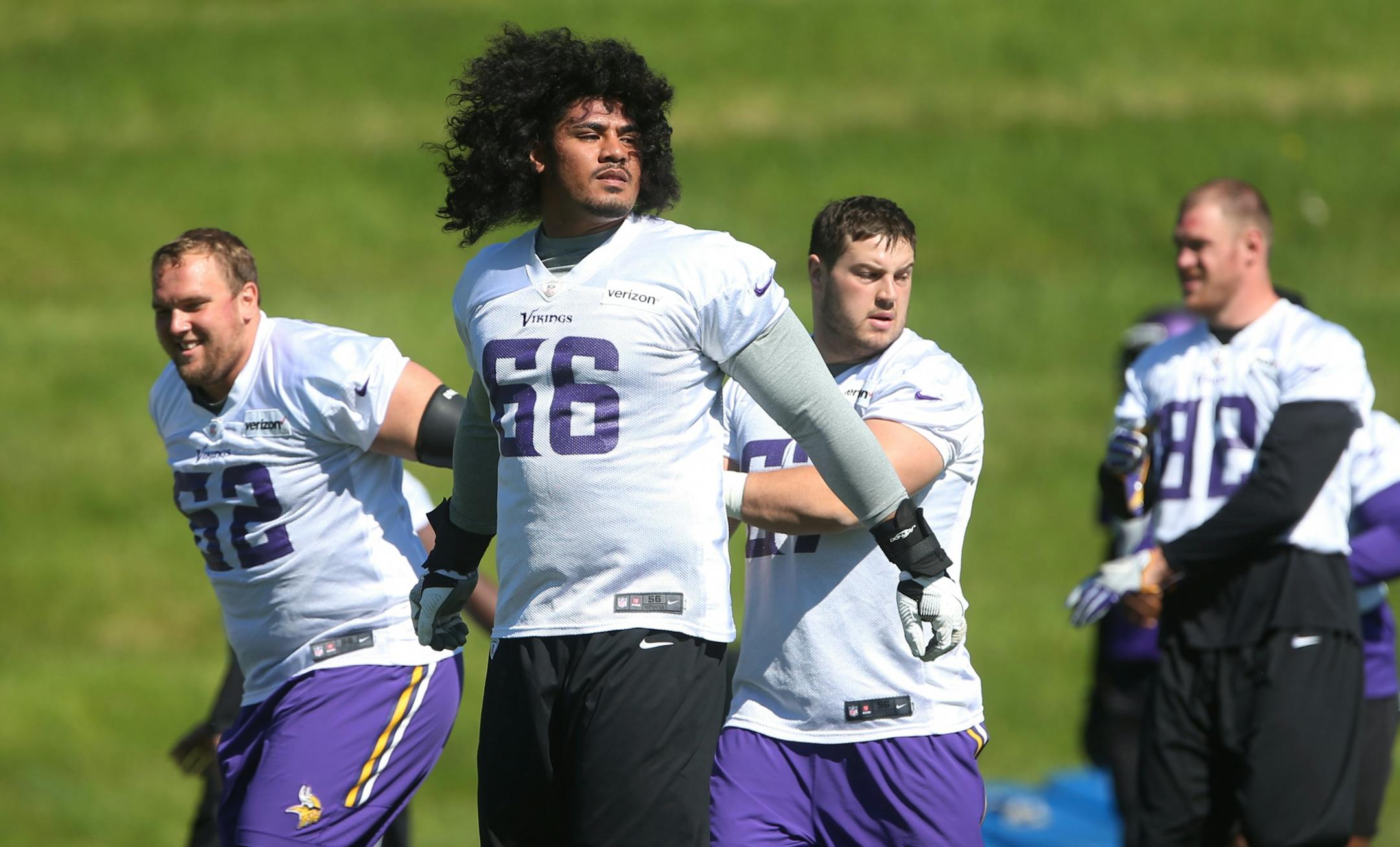 Vikings guard Freddie Tagaloa (66) warmed up with the team Wednesday May 31,2017 in Eden Prairie, MN.