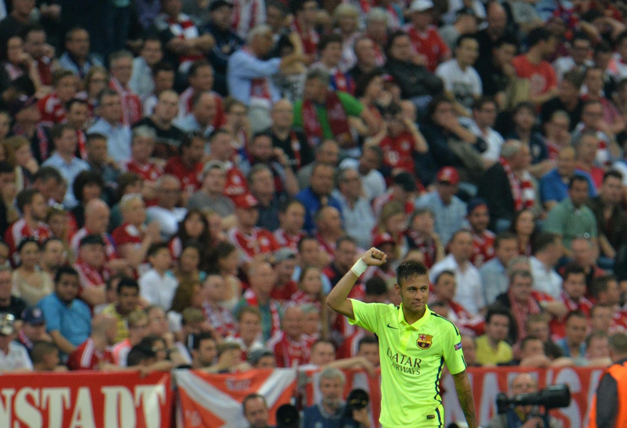 Barcelona's Neymar celebrates scoring his side's 2nd goal during the soccer Champions League second leg semifinal match between Bayern Munich and FC Barcelona at Allianz Arena in Munich, southern Germany, Tuesday, May 12, 2015. (AP Photo/Kerstin Joensson)