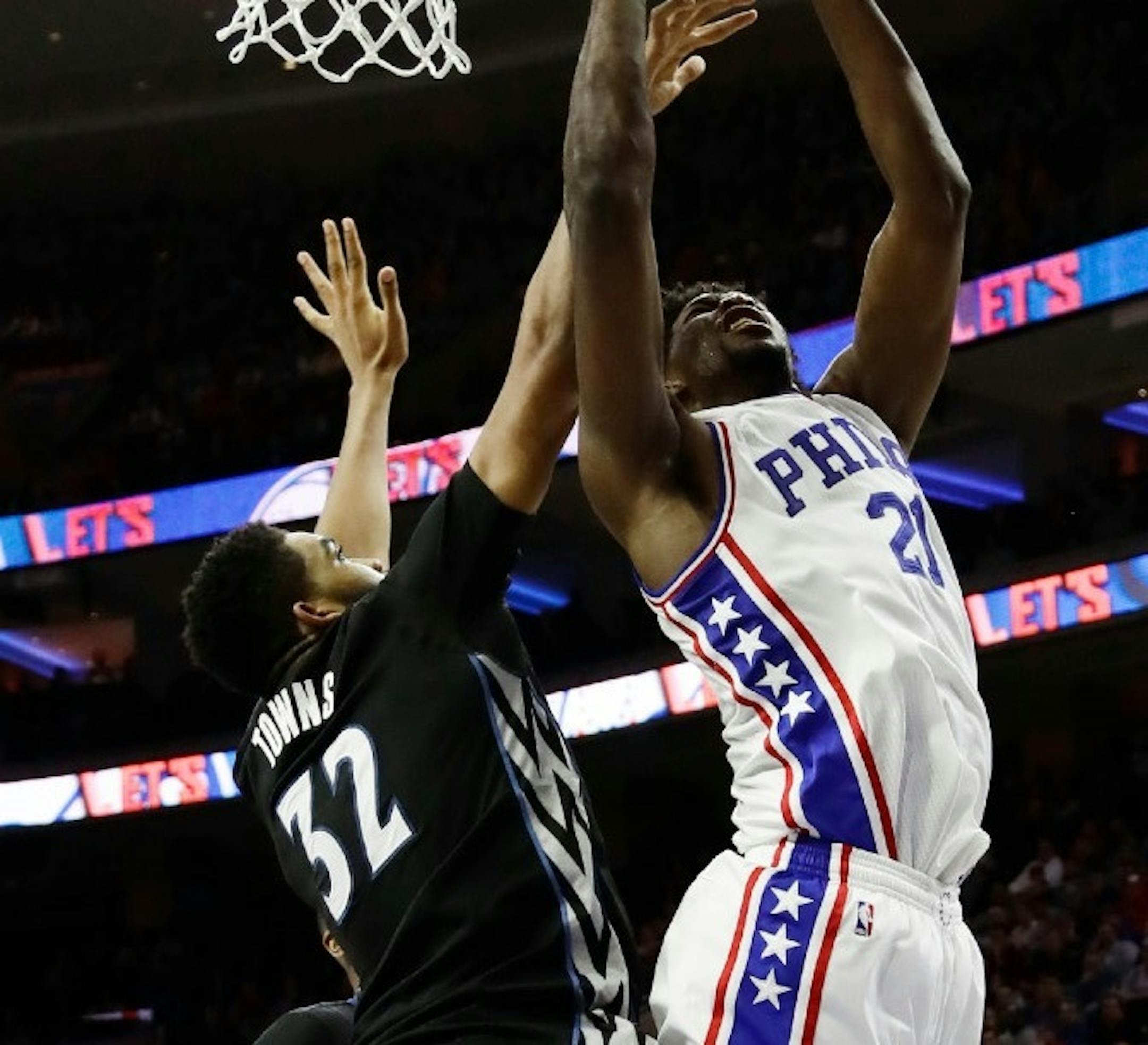 Karl-Anthony Towns guarded 76ers center Joel Embiid during Tuesday's game.