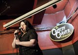 Comedian Rana May uses deadpan delivery to garner laughs during open mic night at Comedy Corner Underground in the basement of the Corner Bar in Minneapolis January 30, 2015.