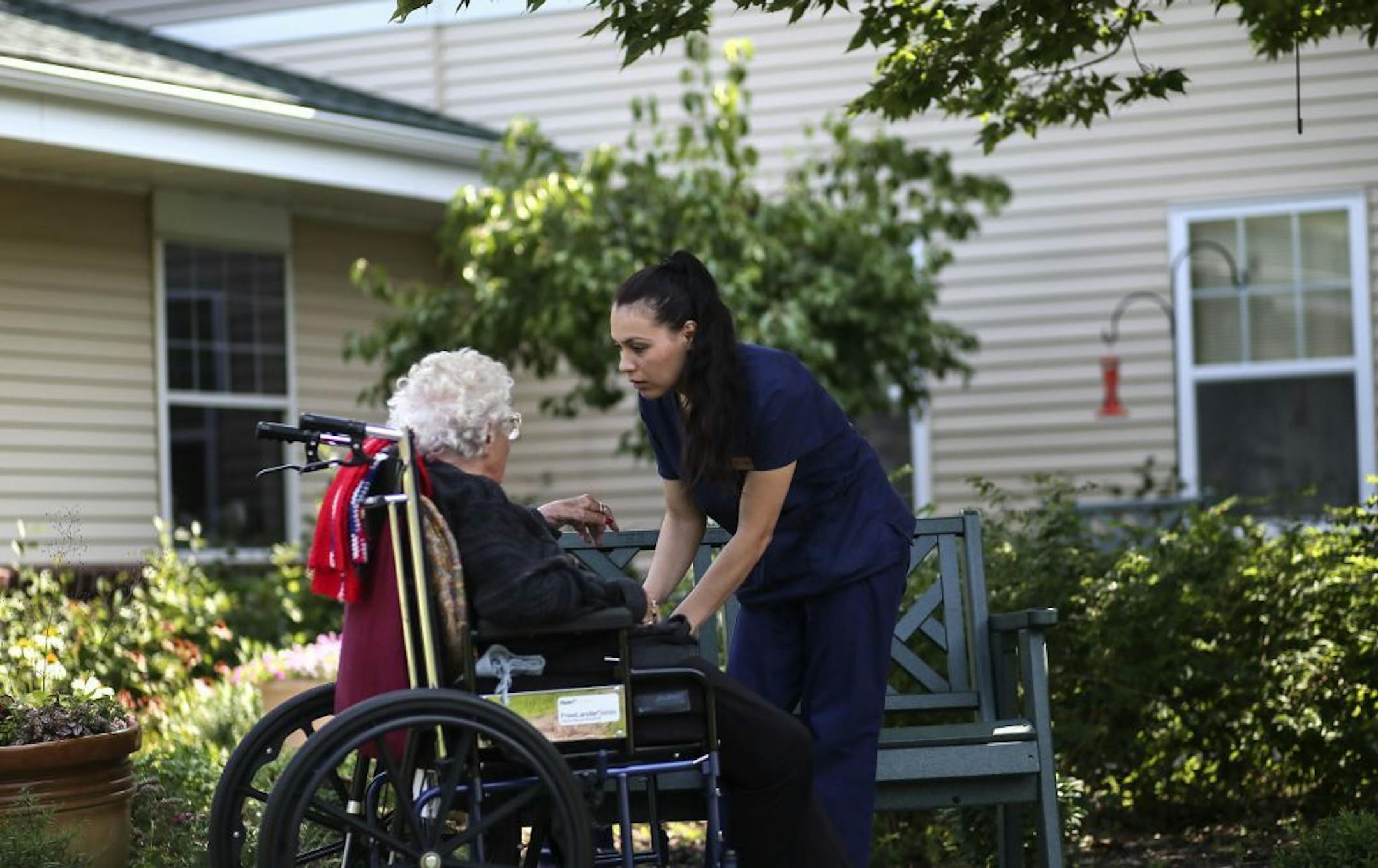 Esmeralda Reyes is a 25-year-old who received job training through Minnesota's FastTRAC adult job training program. The White House cited the program as an example of how to train unemployed or underemployed adults. Esmeralda used the program to become a Certified Nursing Assistant and is now using its services to train as a Licensed Practical Nurse. She was seen Tuesday, July 29, 2014, working with resident Gladys Slight, who is 101 years old and a resident of St. Gertrude's Health Center in Sh