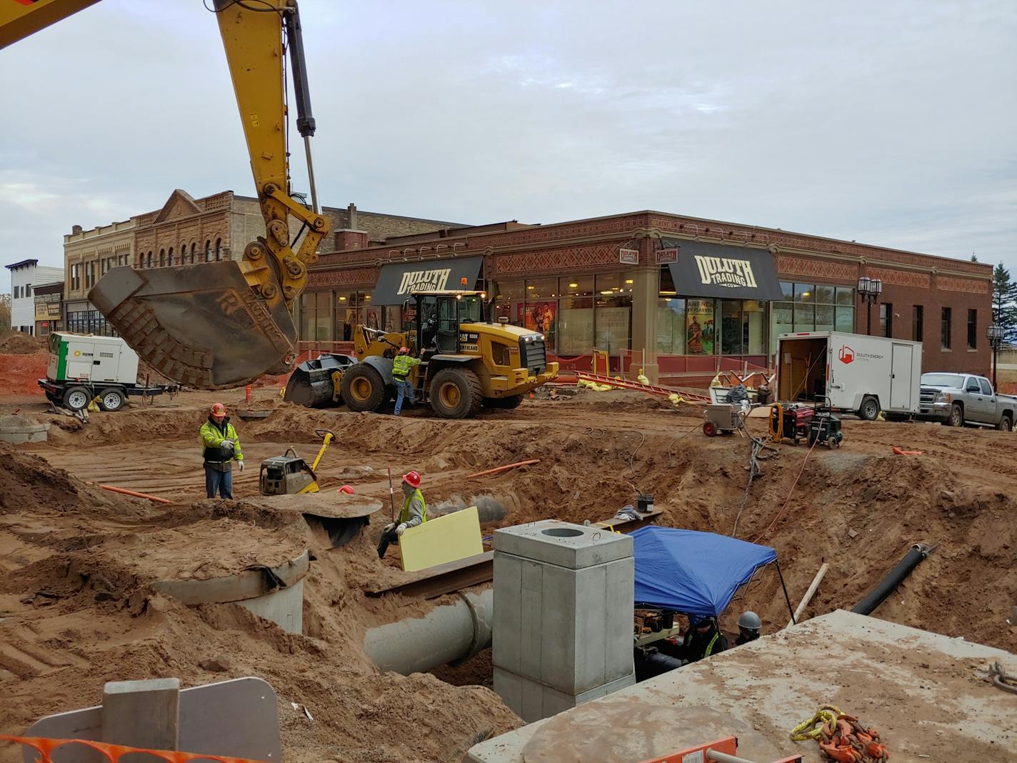 Construction continues on East Superior Street in downtown Duluth on Tuesday. The project is pushing past its original deadline, the end of October, into next month.