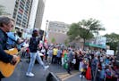 Somali-Canadian poet and rapper K'naan took the stage to a large crowd at the First Annual West Bank Block Party Saturday, Sept. 10, 2016, in Minneapo