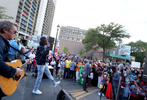 Somali-Canadian poet and rapper K'naan took the stage to a large crowd at the First Annual West Bank Block Party Saturday, Sept. 10, 2016, in Minneapo