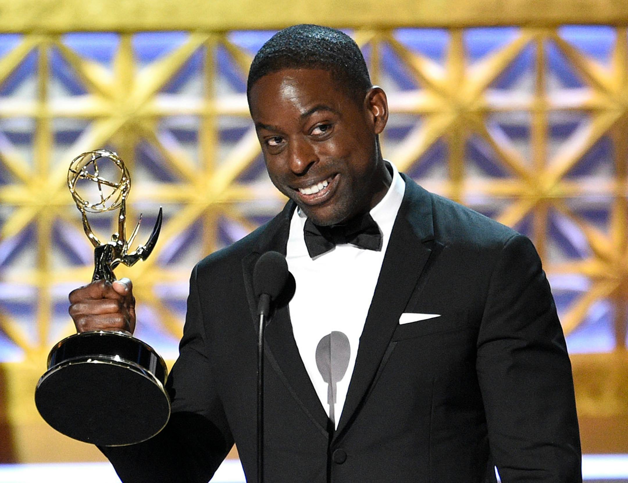 Sterling K. Brown accepts the award for outstanding lead actor in a drama series for "This Is Us" at the 69th Primetime Emmy Awards on Sunday, Sept. 17, 2017, at the Microsoft Theater in Los Angeles.