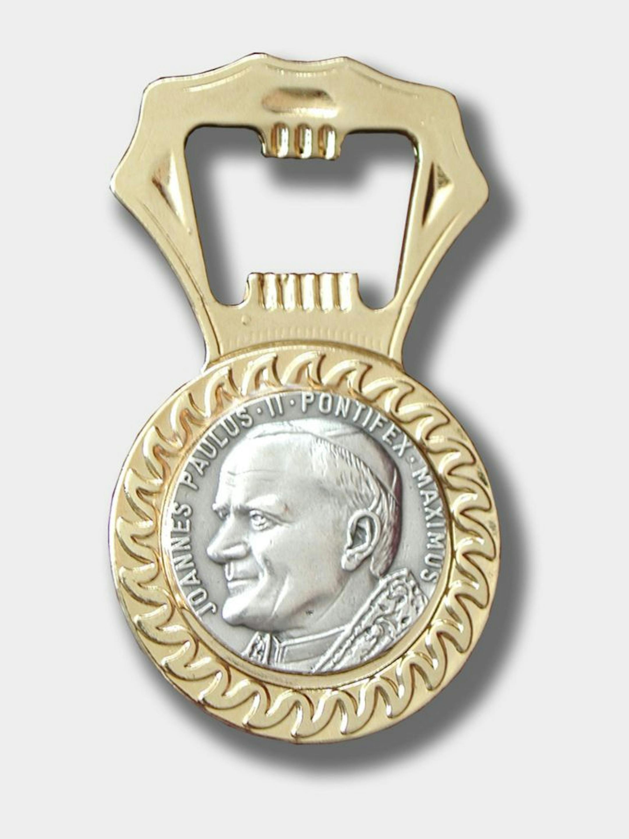 Pope John Paul II bottle opener from the website www.crapsouvenirs.com..