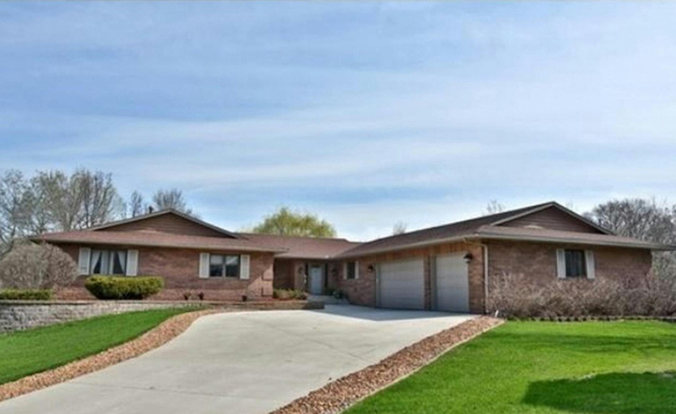 ... Coon Rapids
This four-bedroom, four-bath house has 4,585 finished square feet and features vaulted ceilings, sun room, two fireplaces, partial finished walkout basement, patio, deck, spa and three-car insulated, heated garage. Listed by Sandy Bonestroo, Edina Realty, 612-298-9367.