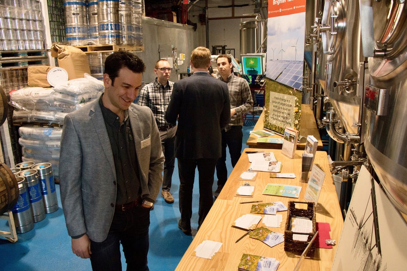 Fresh Energy board member Nate Garbis attends the launch party for Solarama Crush, a special beer 56 Brewing released with the nonprofit, Fresh Energy.