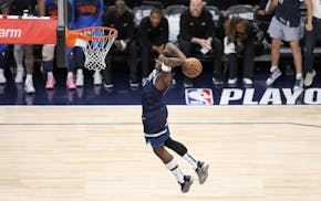 Anthony Edwards of the Wolves dunks in the first quarter.