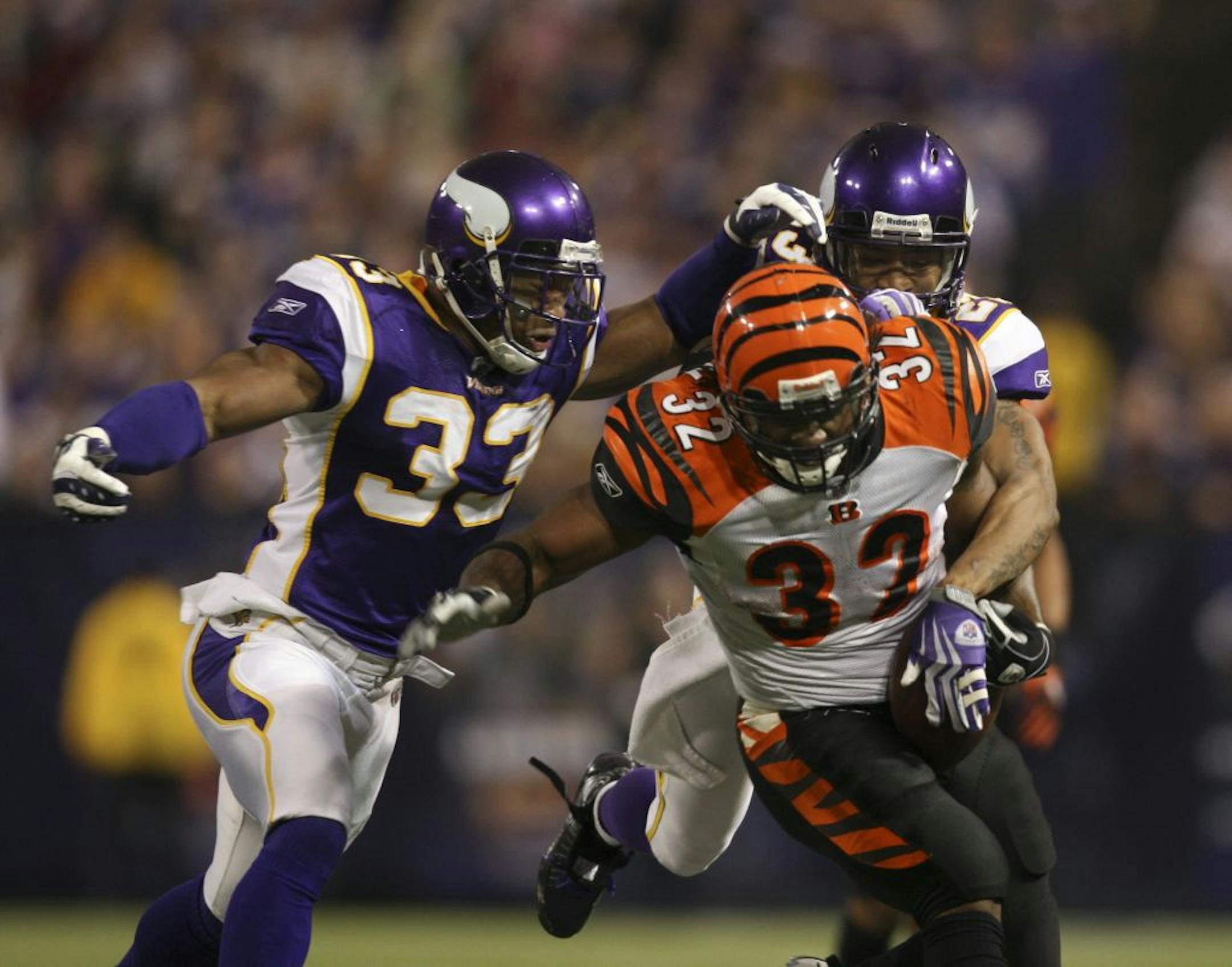 Vikings strong safety Jamarca Sanford, shown wrapping up the Bengals' Cedric Benson in a 2009 game, never forgets he was a seventh-round draft choice. "You always have that on your shoulder," he said.