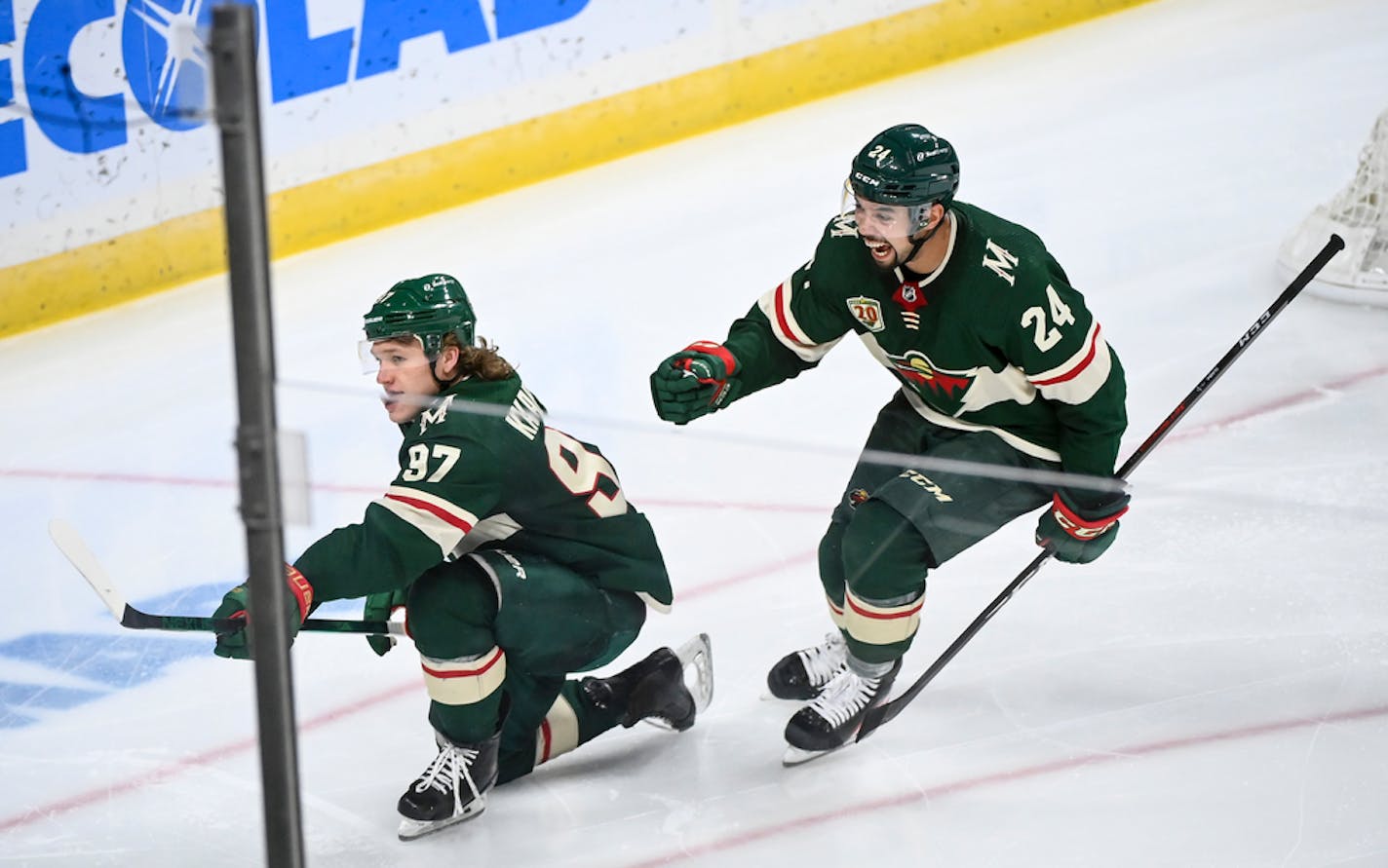 Minnesota Wild left wing Kirill Kaprizov (97) and defenseman Matt Dumba (24) celebrated a goal by Kaprizov in the third period against the Vegas Golden Knights. ] AARON LAVINSKY • aaron.lavinsky@startribune.com