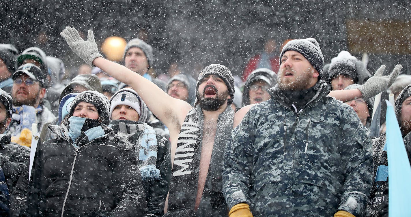 Minnesota United FC fans braved the cold and snow to cheer for the team during the first half as the Minnesota United FC took on Atlanta United at TCF Bank Stadium, Sunday, March 12, 2017 in Minneapolis, MN. ] ELIZABETH FLORES &#xef; liz.flores@startribune.com