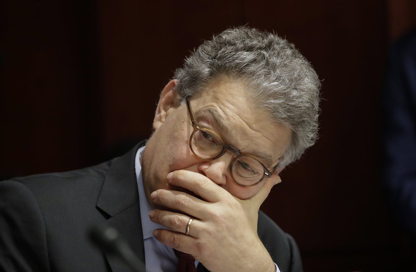 FILE - In this June 21, 2017 file photo, Sen. Al Franken, D-Minn., listens at a committee hearing at the Capitol in Washington. Franken apologized Thursday after a Los Angeles radio anchor accused him of forcibly kissing her during a 2006 USO tour and of posing for a photo with his hands on her breasts as she slept. (AP Photo/J. Scott Applewhite)