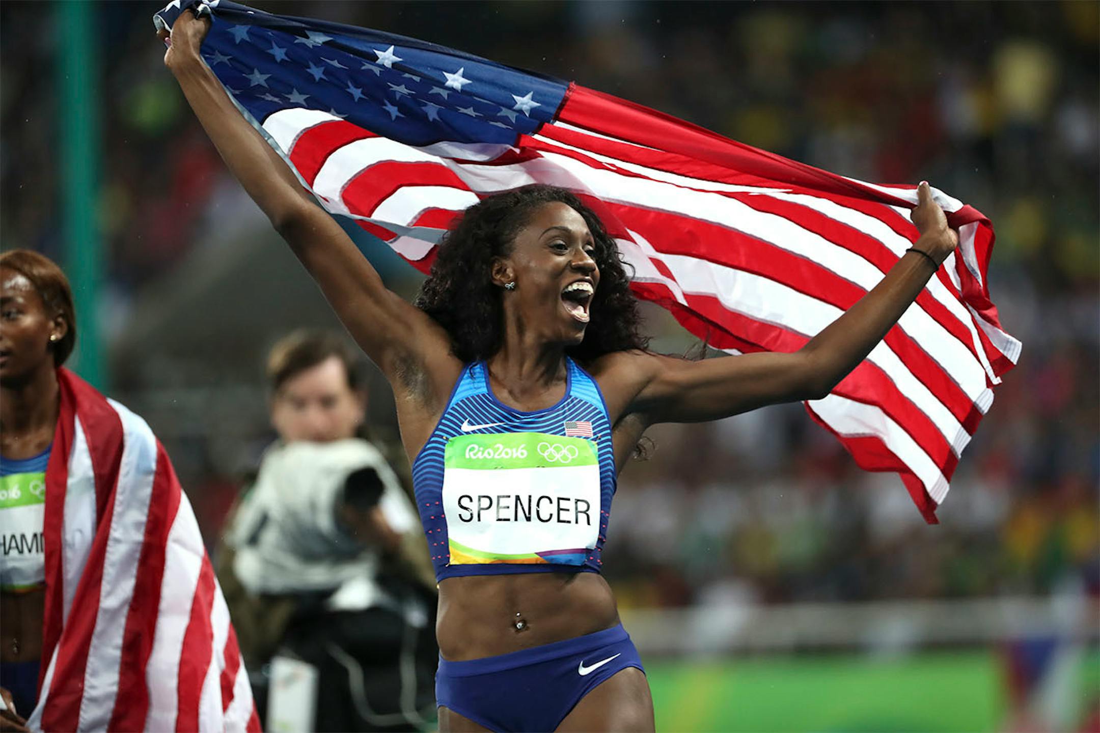 Women's 400 meter hurdles. USA's Ashley Spencer, celebrates her silver medal and teammate Dalilah Muhammad, left, got the gold.