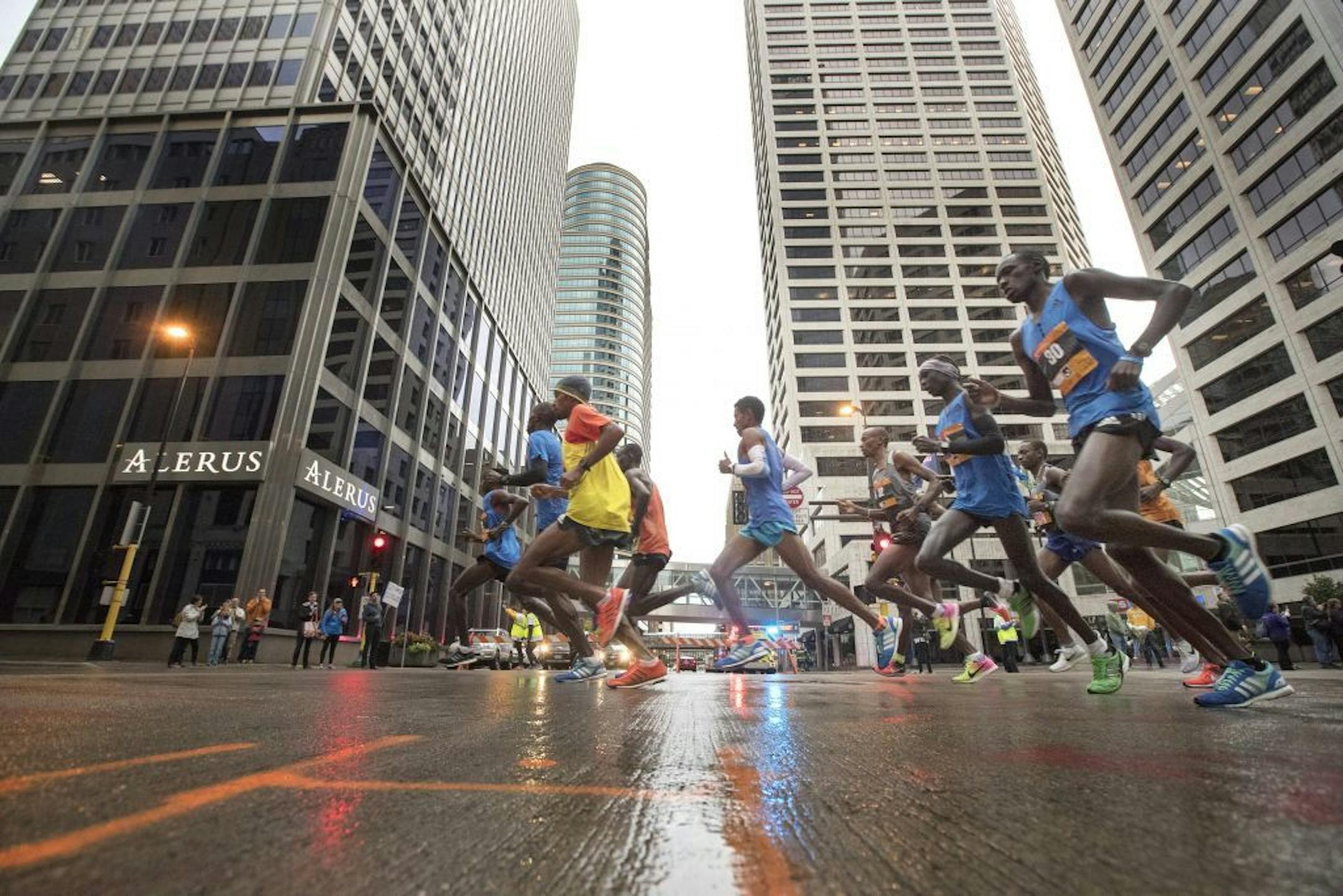 Elite runners make there way though downtown Minneapolis at the the start of the Twins Cities Marathon Sunday October 1,2017 in Minneapolis, MN.