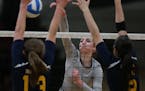 Champlin Park's Sydney Hilley spiked the ball passed the Totino-Grace defense. ] (KYNDELL HARKNESS/STAR TRIBUNE) kyndell.harkness@startribune.com Sect