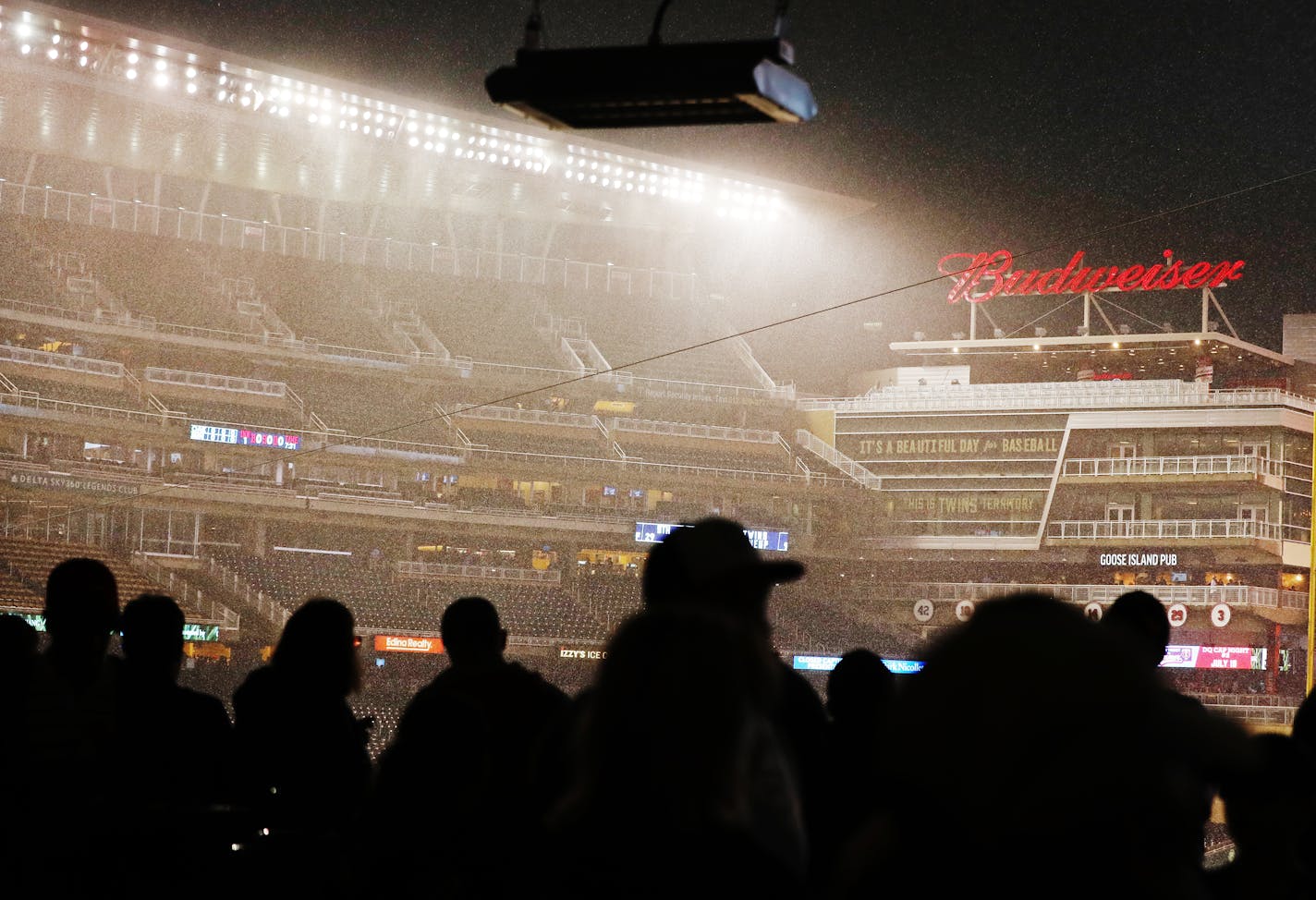 The game was rain-delayed because of lightning strikes and rain.[At the Twins game against the A's at Target Field.Richard Tsong-taatarii@startribune.com