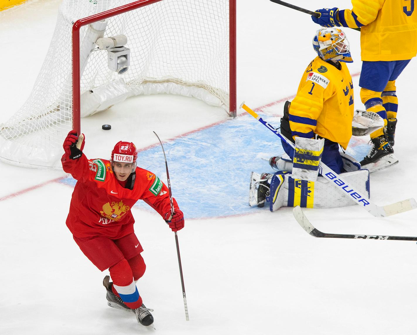 Russia's Marat Khusnutdinov reacts to the team's goal against Sweden during the third period of an IIHF World Junior Hockey Championship game Wednesday