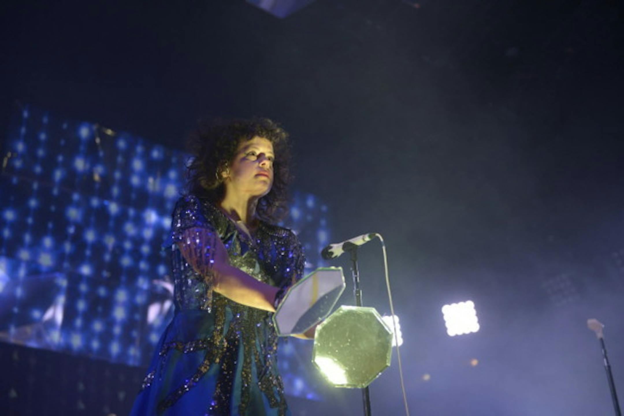 Arcade Fire co-leader Regine Chassagne armed herself with some nifty mirror paddles during "Reflektor" early in Saturday's Target Center concert. / Photo by Amanda Snyder, Star Tribune