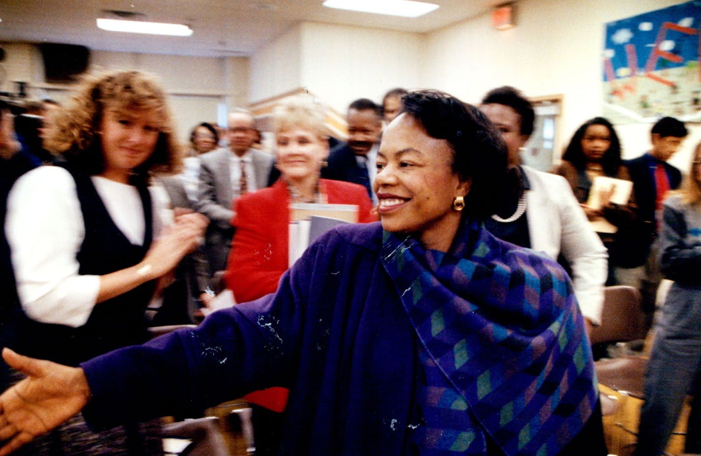 November 3, 1993 Mayor-Elect Sharon Sayles Belton visited the Mpls School Board meeting Wednesday on her first day as Mayor-Elect. They were enmeshed in the selection of a new school board superintendant. She said their choice was difficult and she would support it. She made the rounds of the room shaking hands and being congratulated at large. November 7, 1993 Mike Zerby, Minneapolis Star Tribune