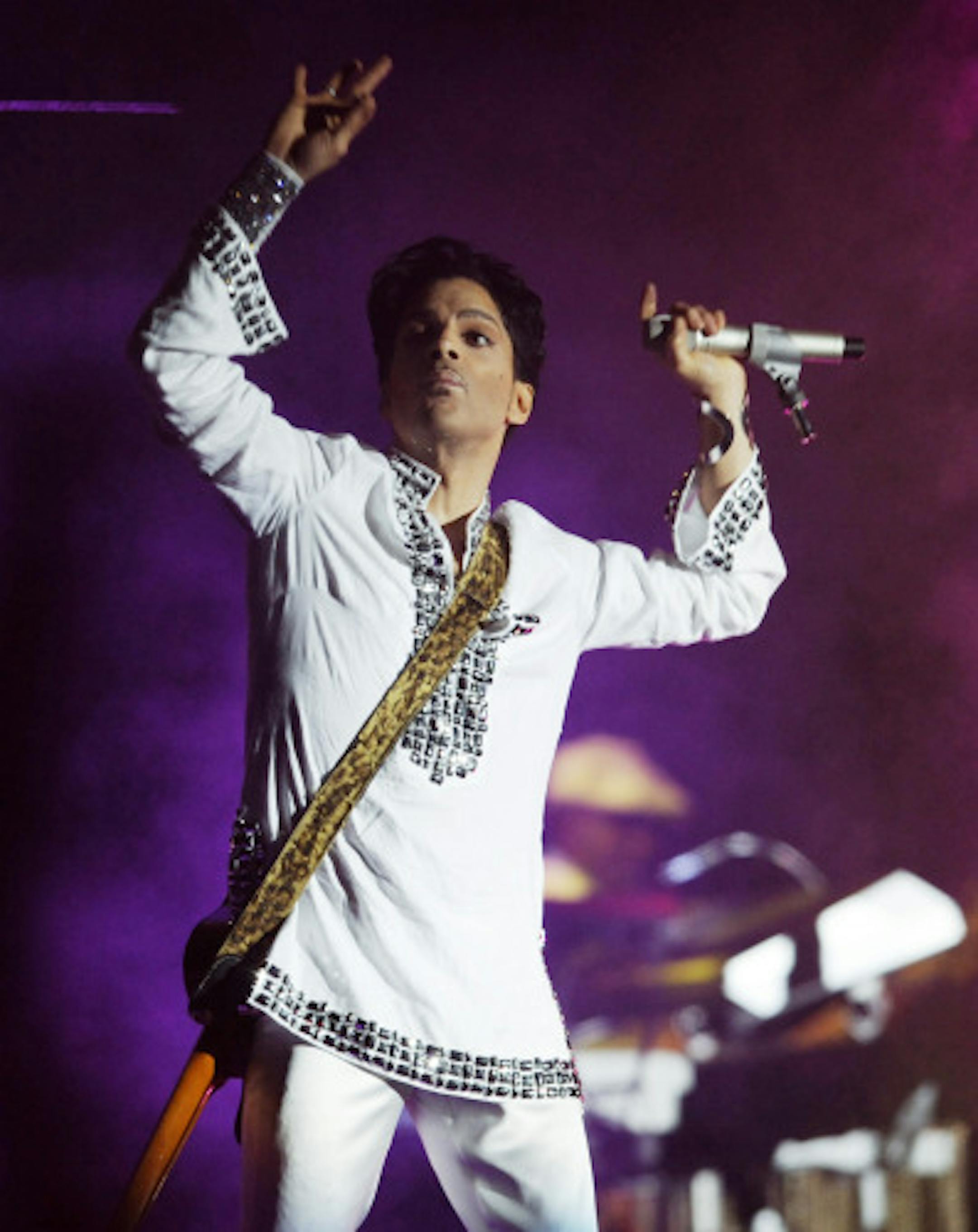 In this file photo of April 26, 2008 Prince performs during the second day of the Coachella Valley Music and Arts Festival in Indio, Calif.