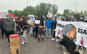 Protesters chant outside Sherburne County jail on Wednesday in support of Isabel Lopez, an activist and poet who was arrested by federal officers days