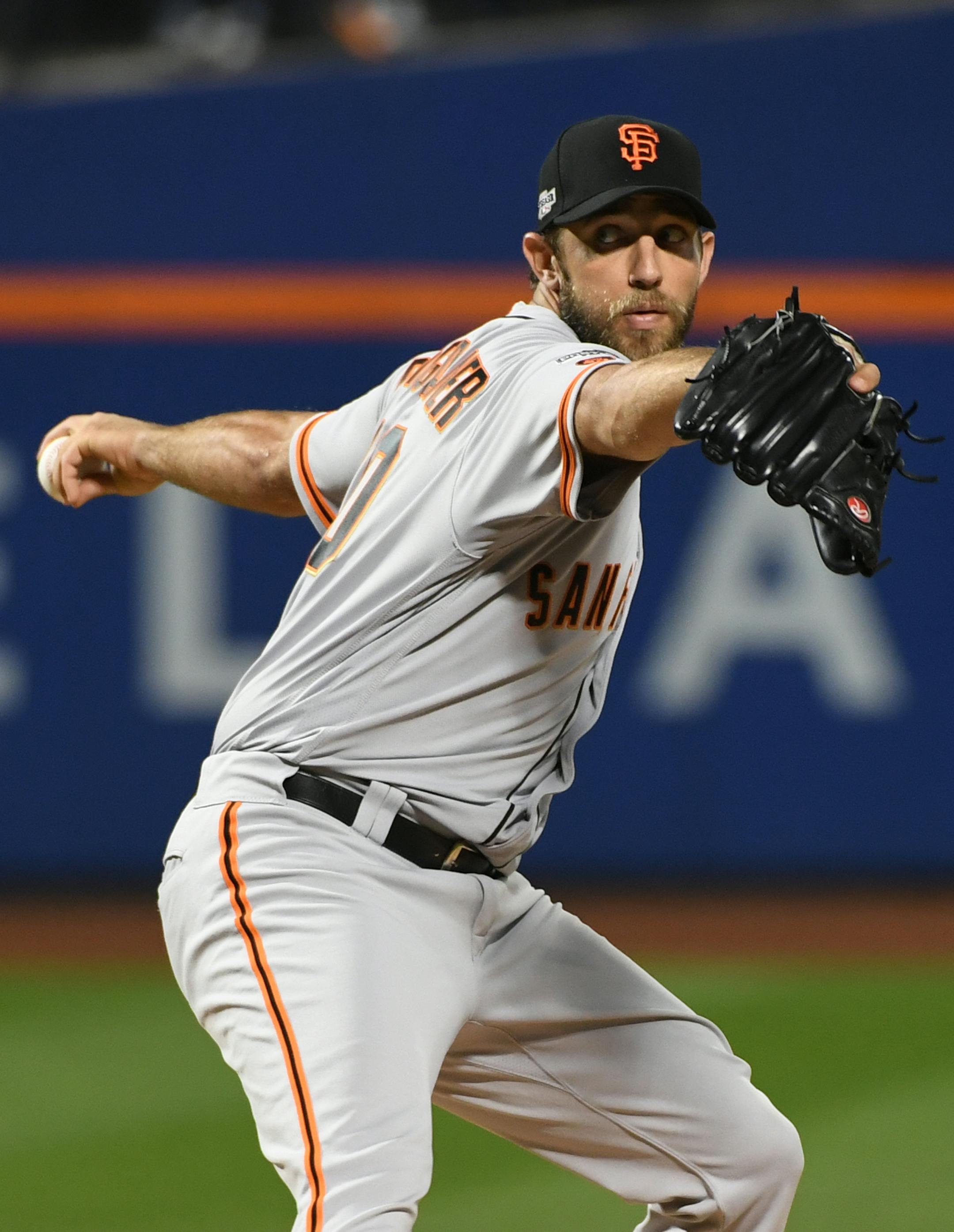 Madison Bumgarner of the San Francisco Giants pitches in the first inning during the National League Wild Card Game against the New York Mets on Wednesday, Oct. 5, 2016, at Citi Field in New York. (Thomas A. Ferrara/Newsday/TNS) ORG XMIT: 1191243