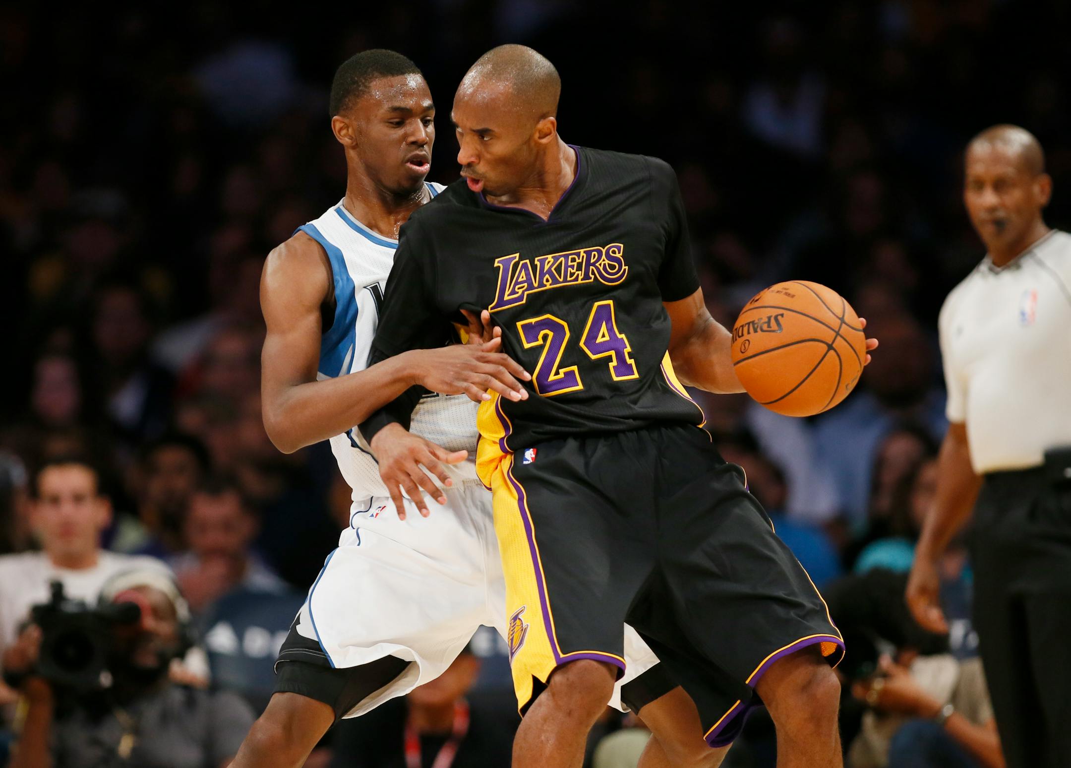 Wolves rookie Andrew Wiggins, left, got a chance to guard the Lakers’ Kobe Bryant for the first time on Nov. 28. Bryant scored 26 points. Their teams meet again Sunday night at Target Center.