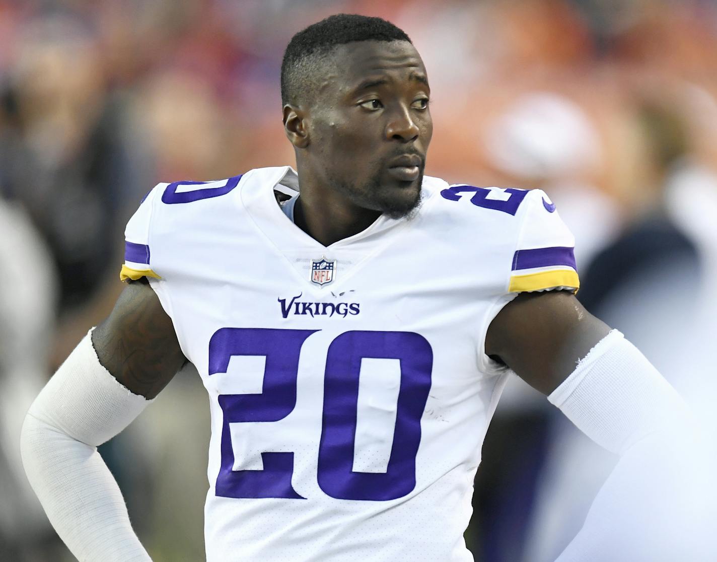 Minnesota Vikings cornerback Mackensie Alexander on the sidelines in the first half of an NFL football game against the Denver Broncos Saturday, Aug. 11, 2018, in Denver. (AP Photo/Mark Reis)