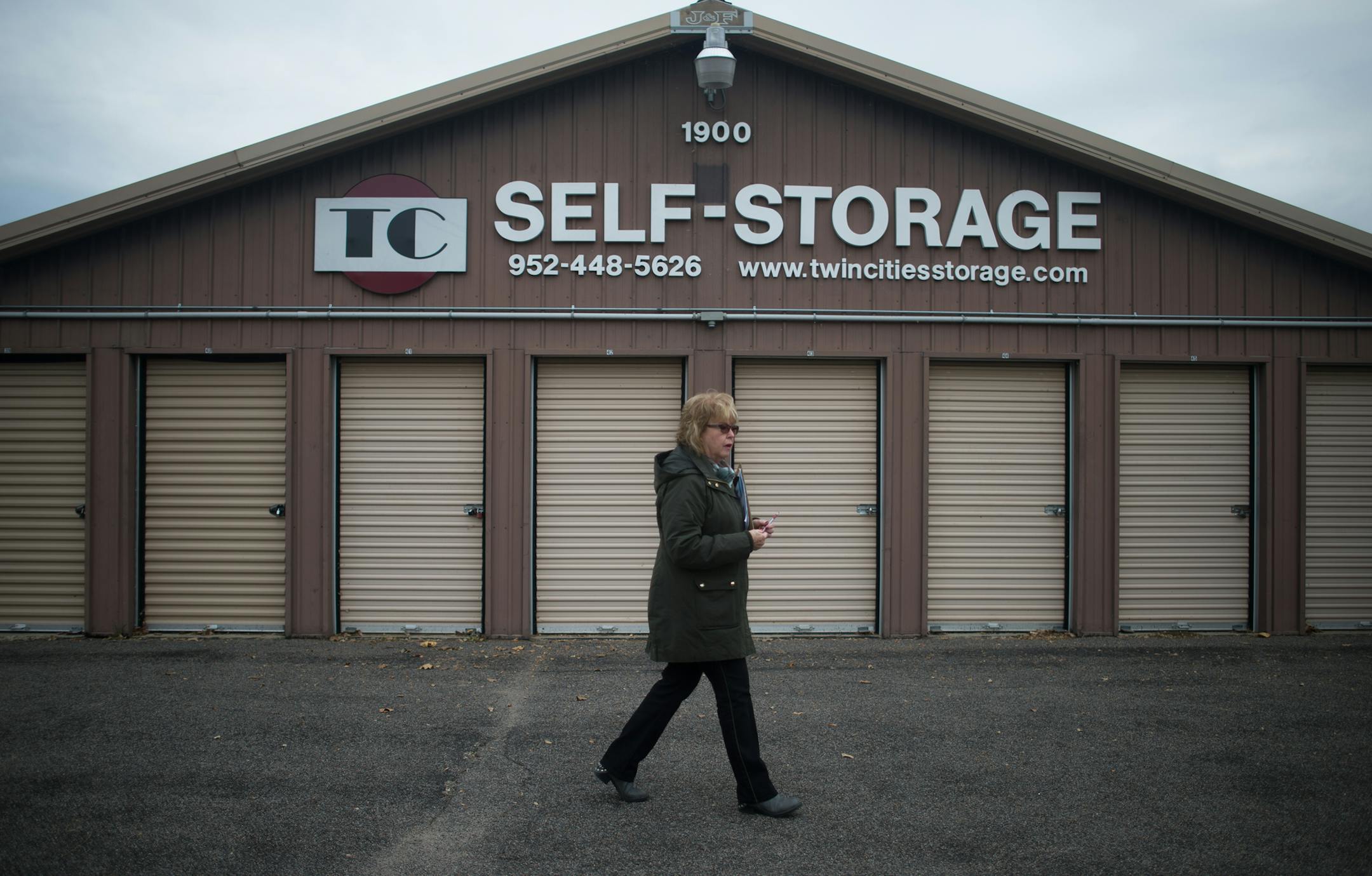 Janet Ascher (cq), assistant manager of Twin Cities Self Storage, makes her rounds throughout the facility Thursday morning. ] AARON LAVINSKY &#x2022; aaron.lavinsky@startribune.com Mini-storage operations continue to pop up across the Twin Cities landscape, fueled by people's propensity to accumulate more possessions than can fit into their homes. Bruce Lamo (cq), owner and operator of Twin Cities Self Storage, is planning to expand his business to meet the growing demand of people needing to s