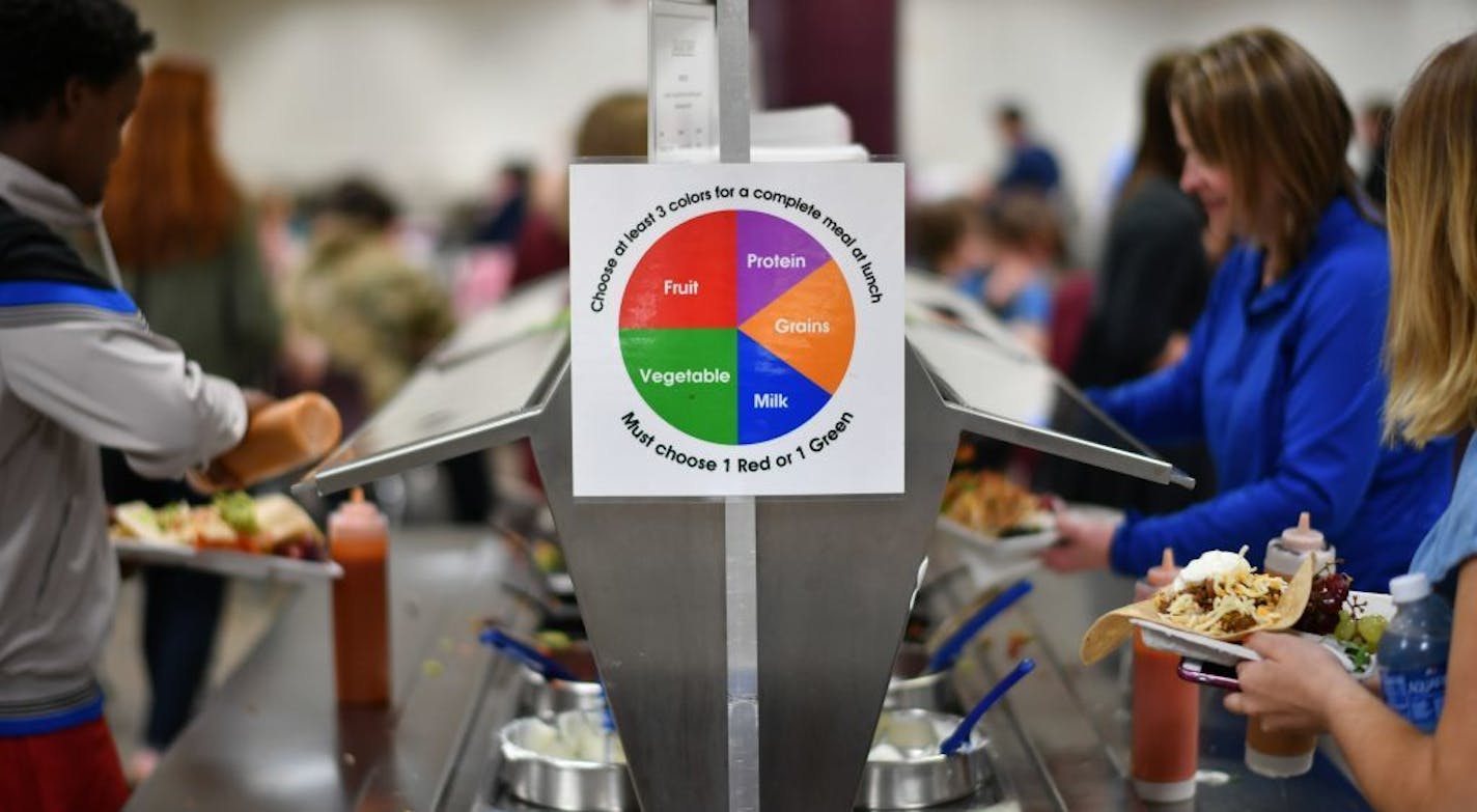 Healthy eating signs in the Owatonna High School cafeteria.