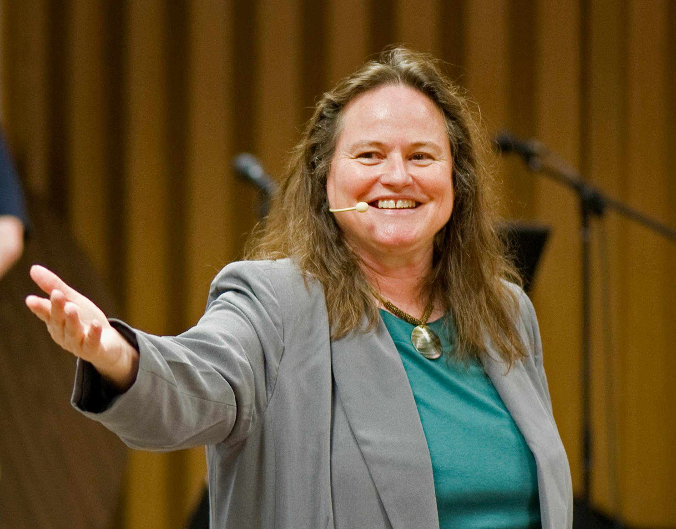 Rev. Julie Jacobs welcomes a group.