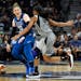 Minnesota Lynx guard Lindsay Whalen (13) directed her teammates while moving the ball down the court under defense by Las Vegas Aces guard Moriah Jeff