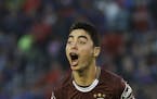 Lanus' Miguel Almiron celebrates scoring against San Lorenzo during the final match of the local soccer tournament in Buenos Aires, Argentina, Sunday,